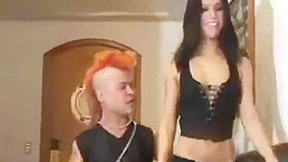 A punk dwarf bonks a young dark brown.