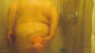 My morbidly chubby older slutty wife in the shower room undressed