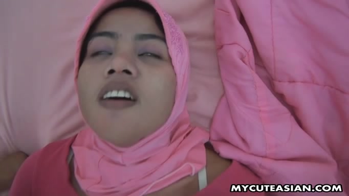 Cute and young Asian housewife in hijab pleases her fellow - XXX ...
