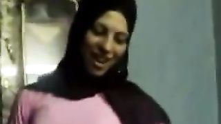 Pretty Arab girl dances in front of a camera in homemade movie scene