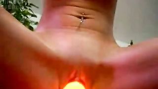 Pretty brunette wife makes love to her pussy with her lava lamp