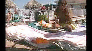 Young golden-haired sucks and copulates at the pool during the time that being watched by onlookers