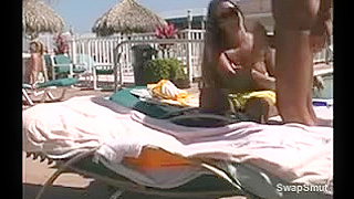 Young golden-haired sucks and copulates at the pool during the time that being watched by onlookers