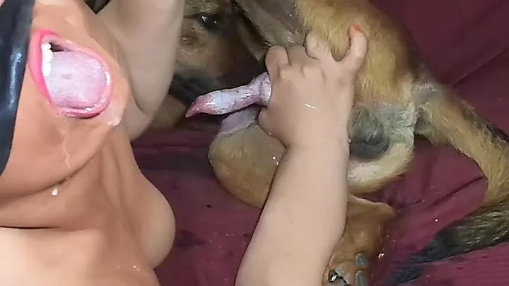 Young cute girl gets a mouthful of cum after sucking dog cock.