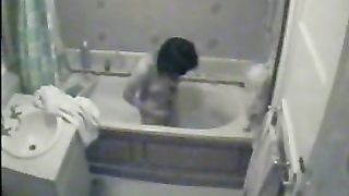 Wife gets really naughty and masturbates while in the warm tub