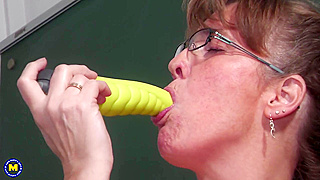 Busty Mature Slut with Glasses Rubs Her Dripping Wet Pussy in Solo Action