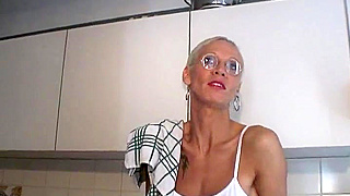 Stunning Glasses-Clad Blonde on Her Knees Sucking Cock Like a Pro