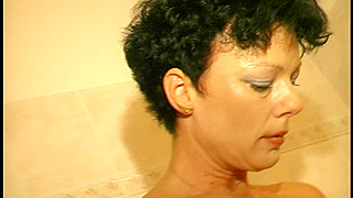 Voluptuous Mature Chick with Short Hair Rides Cock Like a Pro in Steamy Session