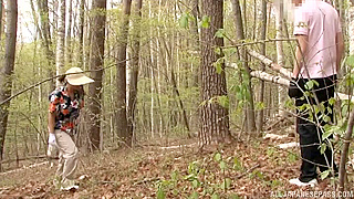 Mature Japanese Golfer Bends Over and Takes It Hard from Her Caddy in the Woods