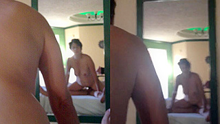Busty Tattooed Milf Sucks Dick in Front of a Mirror