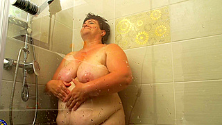 Passionate Redhead BBW Deepthroats a Hard Cock with Delight