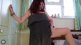 Busty Curly-Haired Redhead Mature Amateur Flaunts and Twerks Her Massive Ass