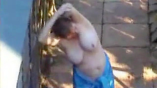 Horny Mature Neighbour Caught Masturbating In The Garden