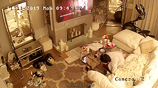 A gal lives alone, often undressed or changing garments