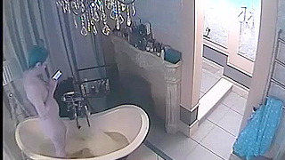 Two bathrooms, taking baths