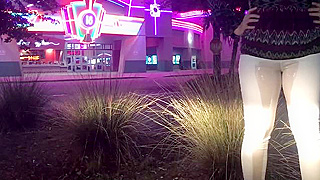 She pisses her white pants in the parking lot