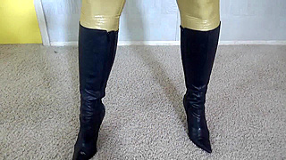 The blonde slut in a yellow latex suit finds herself tied up