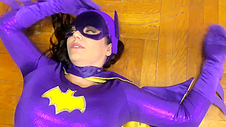 A couple of olders heroines are wearing the tight Batgirl outfit