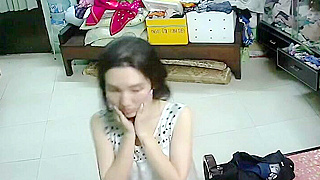 Vietnamese Cutie Teasingly Gets Dressed, Revealing Curves