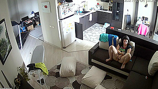 Peeking At A Horny Babe On The Couch Spreading Her Legs And Touching Her Wet Pussy