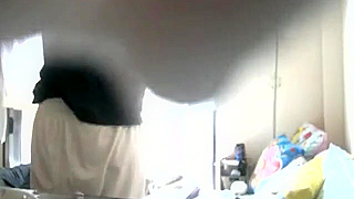 Covert Cam Captures Japanese Girl's Steamy Masturbation