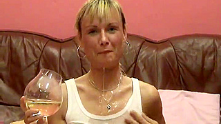 Blonde milf enjoys golden rain after sucking a cock